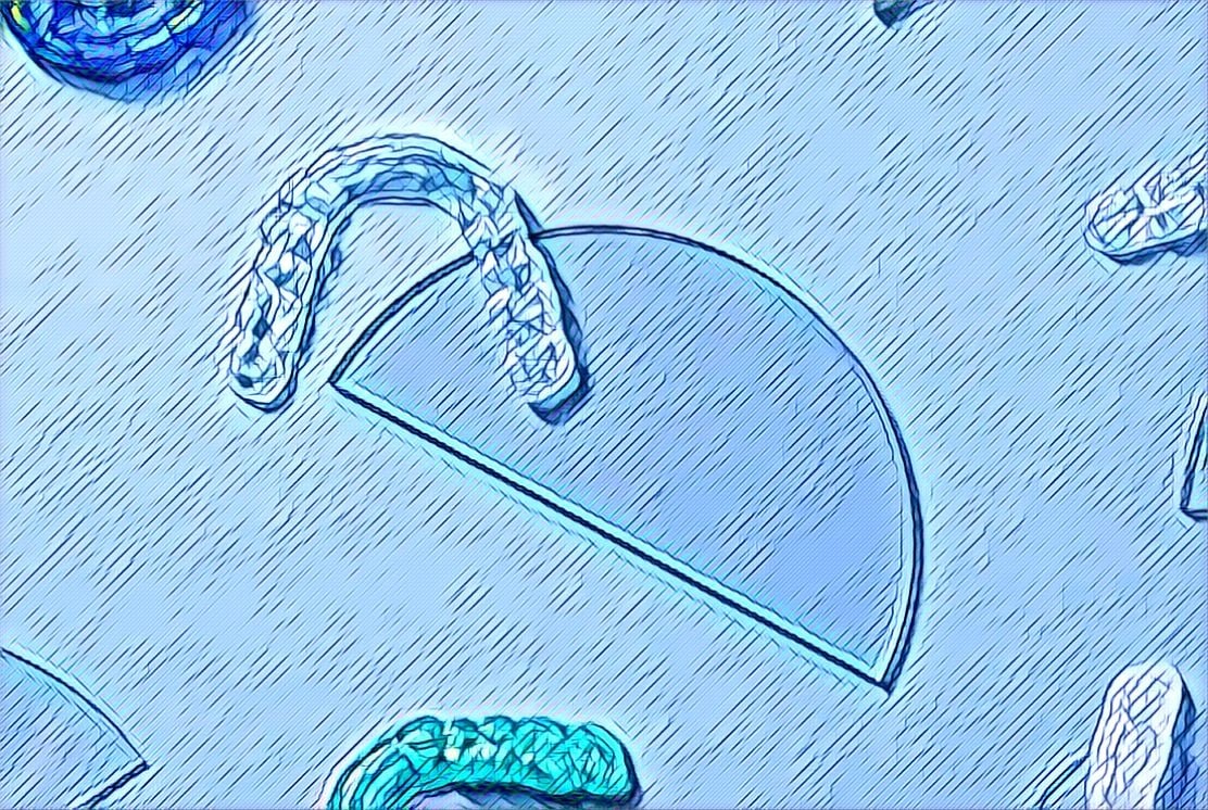 Mouthguards on a blue background
