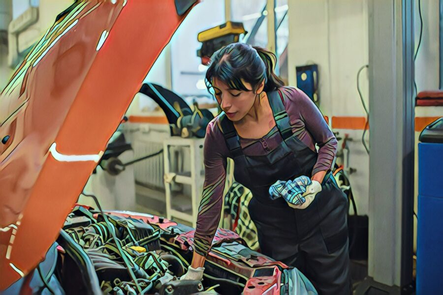 Woman working on car